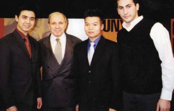 Roger Hertog with Hertog Scholars Alan Liang, Victor Law, and Adam Dayan